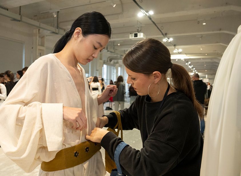 Which Milan programmes guarantee hands-on experience with top-tier industry brands?